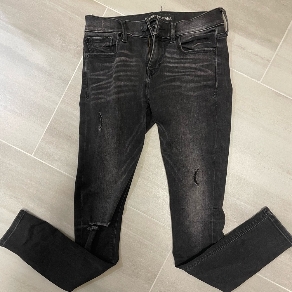Express distressed mid rise skinny jeans with stretch. Size 2.
